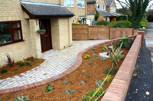Front and back gardens rebuilt, with a block paved drive